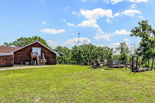 10626 W State Highway 76, Cape Fair, MO 65624 - view of grassy yard featuring an outdoor fire pit