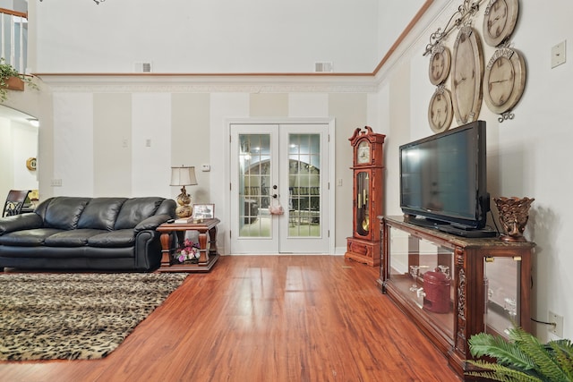 180 Grace Chapel Rd Unit 325, Blue Eye, MO 65611 - living room featuring french doors, wood finished floors, and a towering ceiling
