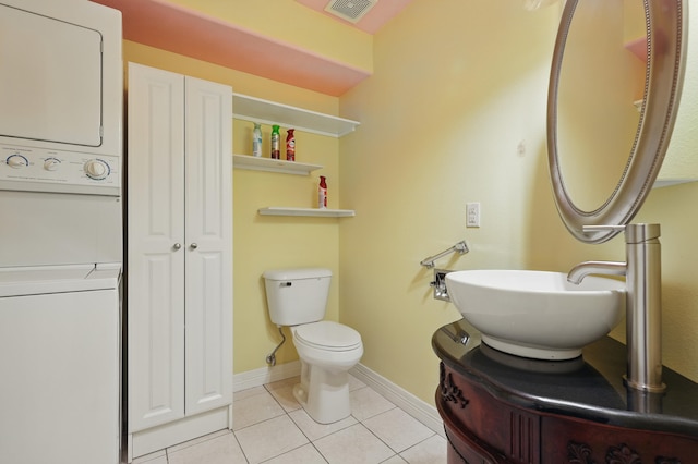 180 Grace Chapel Rd Unit 325, Blue Eye, MO 65611 - bathroom featuring estacked washer and dryer, tile patterned floors, and vanity