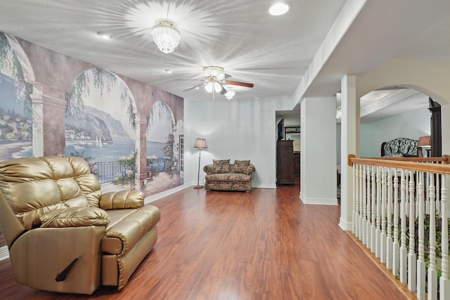 180 Grace Chapel Rd Unit 325, Blue Eye, MO 65611 - sitting room with ceiling fan, wood finished floors, arched walkways, and recessed lighting