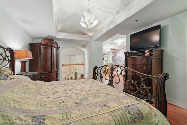 180 Grace Chapel Rd Unit 325, Blue Eye, MO 65611 - bedroom featuring wood finished floors, crown molding, a chandelier, and a tray ceiling