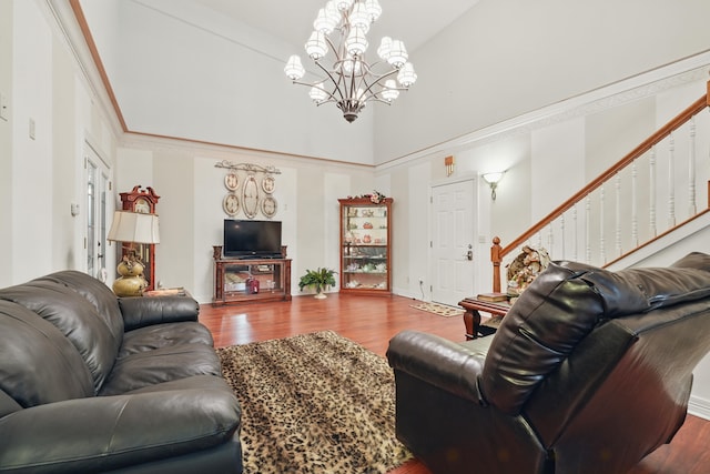 180 Grace Chapel Rd Unit 325, Blue Eye, MO 65611 - living room with a chandelier, wood finished floors, stairs, and a high ceiling