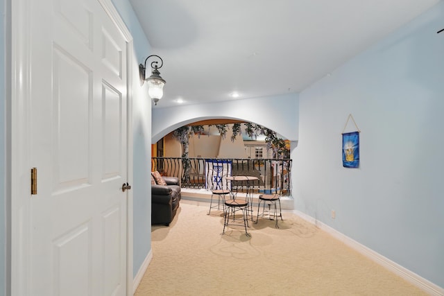 180 Grace Chapel Rd Unit 325, Blue Eye, MO 65611 - sitting room with arched walkways, carpet floors, and recessed lighting