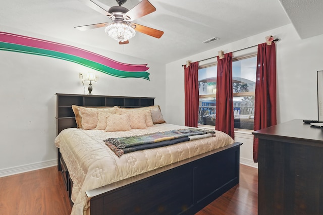 180 Grace Chapel Rd Unit 325, Blue Eye, MO 65611 - bedroom with dark wood-style flooring and a ceiling fan