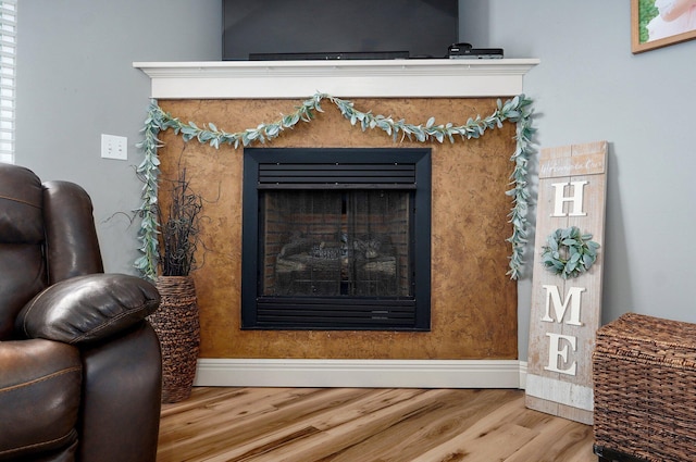 4531 W Somerset Dr, Battlefield, MO 65619 - detailed view of wood finished floors and a fireplace