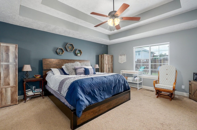4531 W Somerset Dr, Battlefield, MO 65619 - bedroom with a tray ceiling, carpet floors, and a ceiling fan