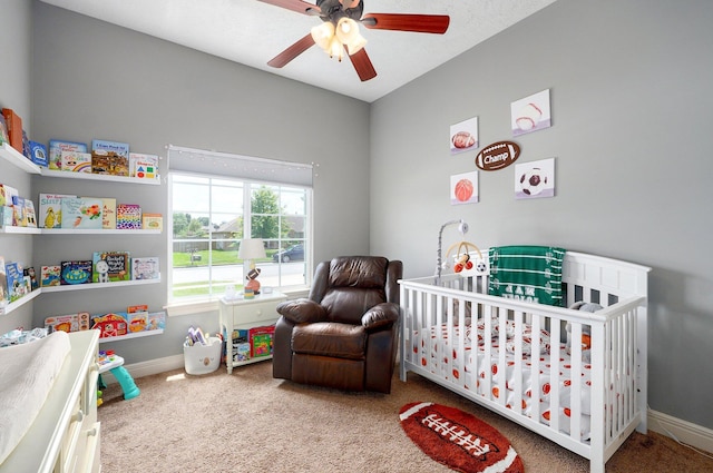 4531 W Somerset Dr, Battlefield, MO 65619 - carpeted bedroom with a crib and ceiling fan