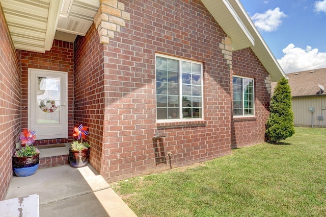 4531 W Somerset Dr, Battlefield, MO 65619 - property entrance featuring brick siding and a yard