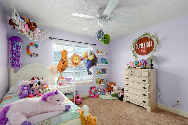 4531 W Somerset Dr, Battlefield, MO 65619 - bedroom featuring light colored carpet, a textured ceiling, and a ceiling fan