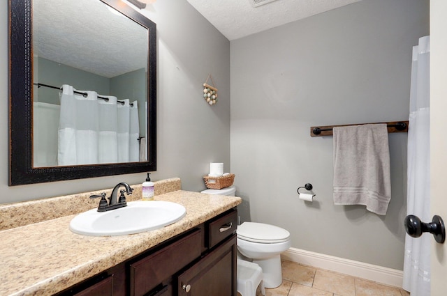4531 W Somerset Dr, Battlefield, MO 65619 - bathroom with vanity, a textured ceiling, tile patterned flooring, and a shower with curtain