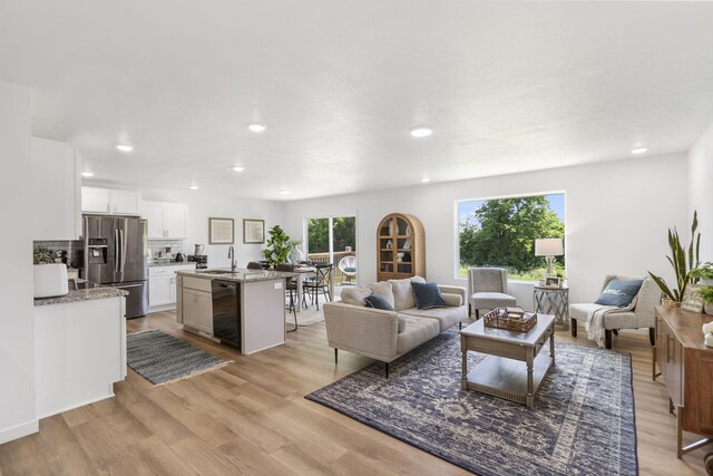202 N Cheyenne Valley Rd, Nixa, MO 65714 - living area with light wood finished floors and recessed lighting