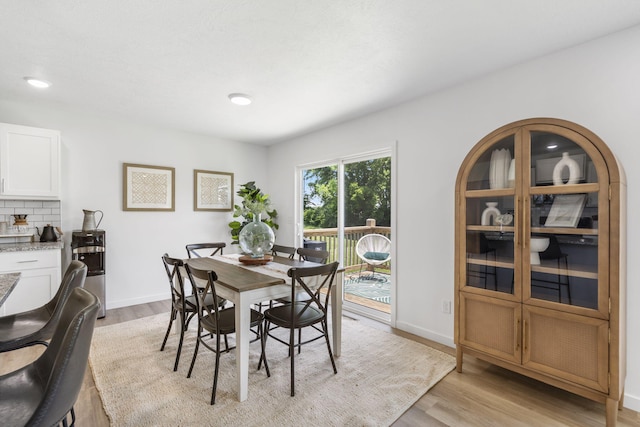 202 N Cheyenne Valley Rd, Nixa, MO 65714 - dining room featuring light wood-type flooring and recessed lighting