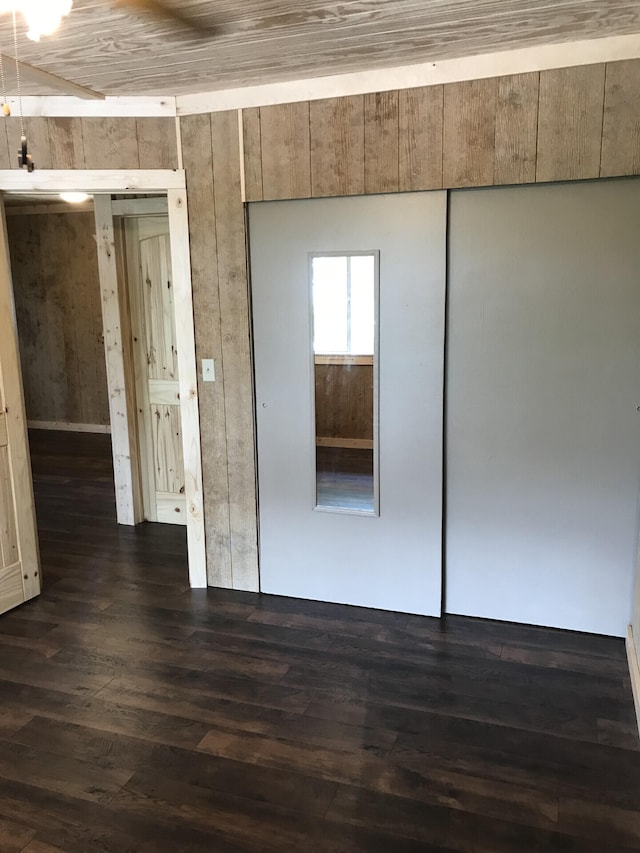462 Campbell Point Rd, Shell Knob, MO 65747 - spare room with dark wood finished floors and wood walls