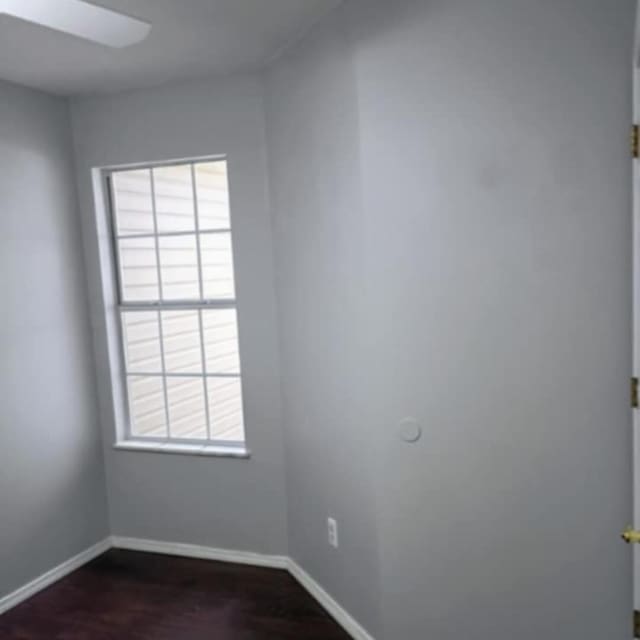315 Buckingham Dr, Branson, MO 65616 - spare room with plenty of natural light and dark wood-style floors
