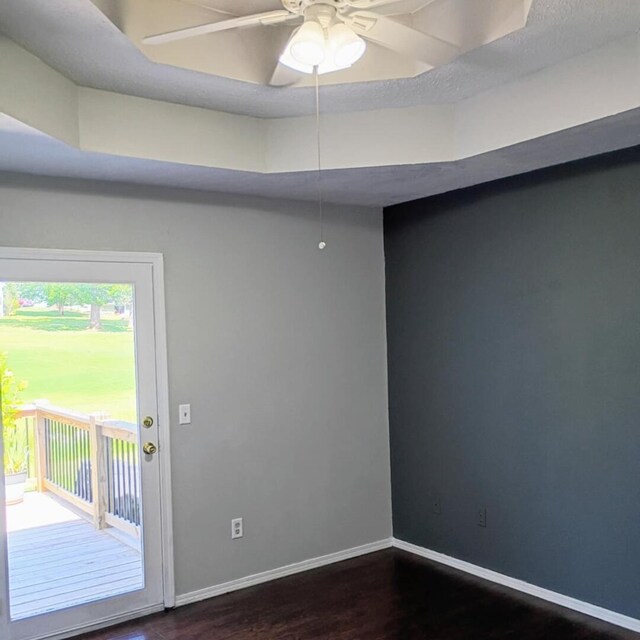 315 Buckingham Dr, Branson, MO 65616 - spare room with dark wood finished floors and ceiling fan