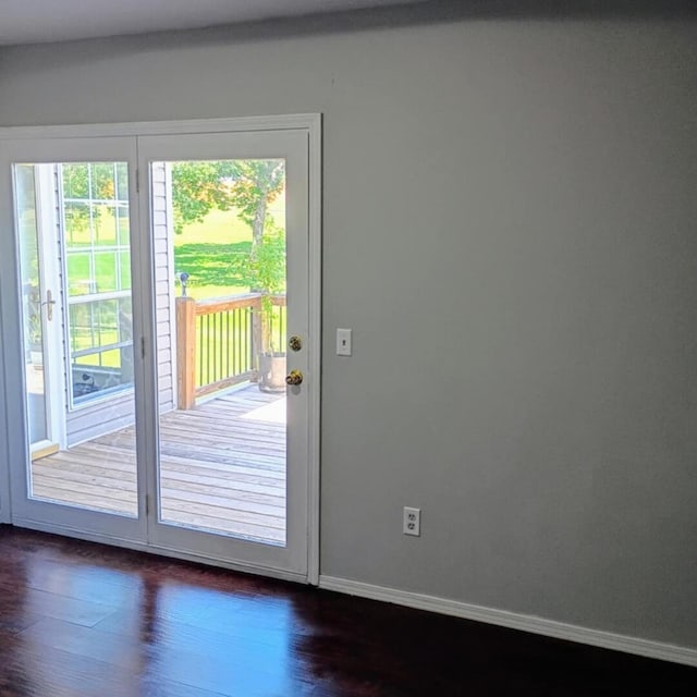 315 Buckingham Dr, Branson, MO 65616 - doorway with dark wood-style floors and baseboards