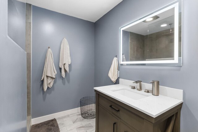 1471 E Bennett St, Springfield, MO 65804 - full bath featuring vanity, marble finish flooring, and tiled shower