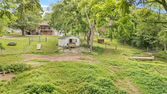 1850 E Farm Road 88, Springfield, MO 65803 - fenced backyard featuring an outbuilding and a wooden deck