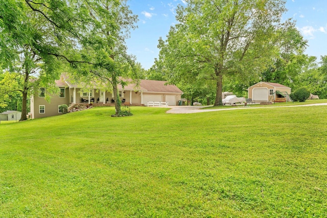 1850 E Farm Road 88, Springfield, MO 65803 - view of green lawn with dirt driveway and a garage