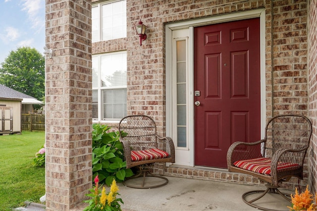 801 S Creekwood Ct, Nixa, MO 65714 - property entrance with brick siding and a lawn