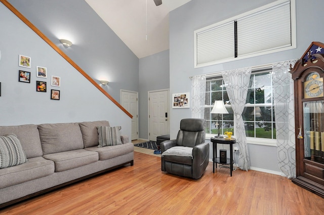 801 S Creekwood Ct, Nixa, MO 65714 - living area with wood finished floors, high vaulted ceiling, and a ceiling fan