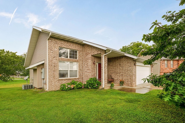 801 S Creekwood Ct, Nixa, MO 65714 - view of front of property with a garage, a front lawn, and brick siding