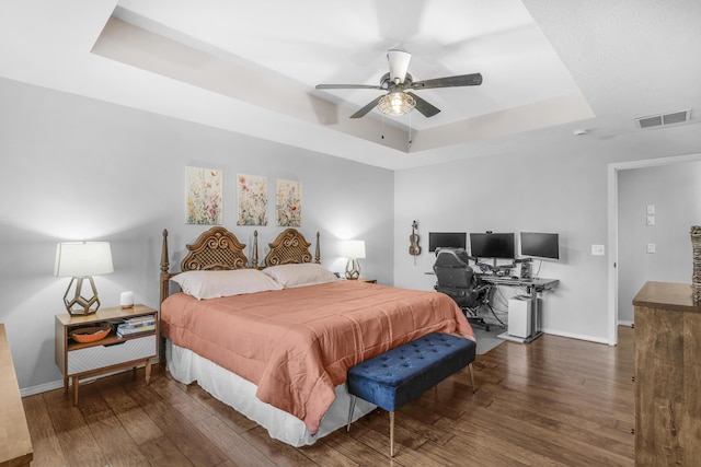 676 E Gallup Hill Rd, Nixa, MO 65714 - bedroom with a raised ceiling, wood-type flooring, a ceiling fan, and a desk