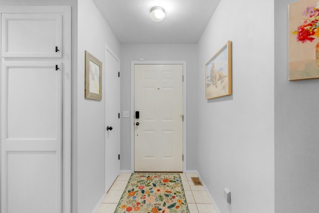 676 E Gallup Hill Rd, Nixa, MO 65714 - doorway to outside featuring baseboards and light tile patterned floors