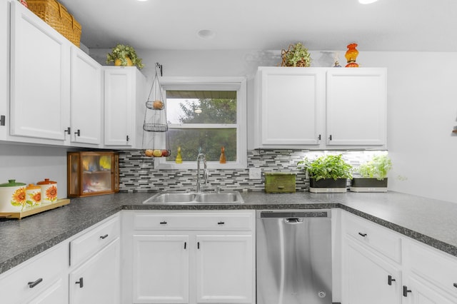 676 E Gallup Hill Rd, Nixa, MO 65714 - kitchen with dishwasher, white cabinetry, decorative backsplash, and dark countertops