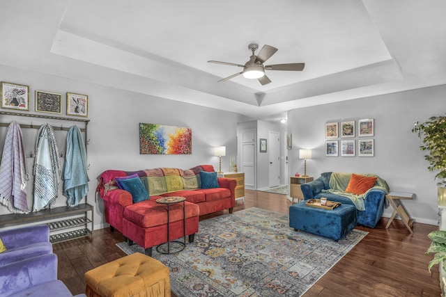 676 E Gallup Hill Rd, Nixa, MO 65714 - living room with a tray ceiling, ceiling fan, and wood finished floors