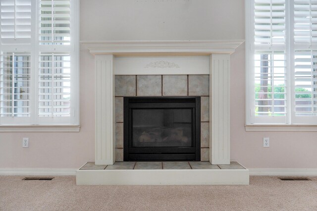276 Steury Rd, Springfield, MO 65809 - detailed view of carpet floors and a tile fireplace