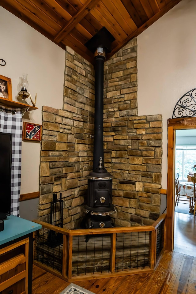 1950 N Crossway Rd, Fair Grove, MO 65648 - unfurnished living room featuring wood ceiling, wood-type flooring, and a wood stove