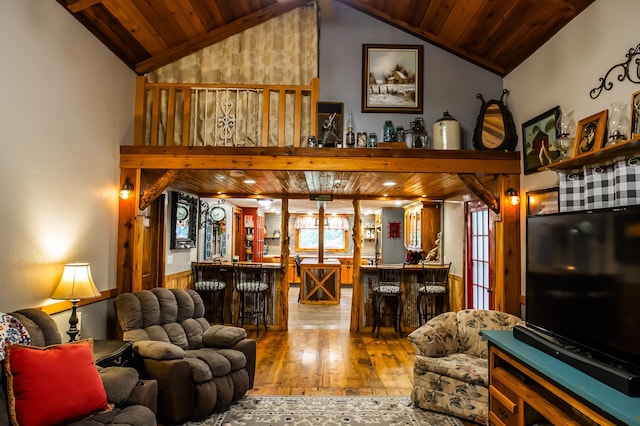 1950 N Crossway Rd, Fair Grove, MO 65648 - living room featuring hardwood / wood-style flooring, wood ceiling, a dry bar, and high vaulted ceiling