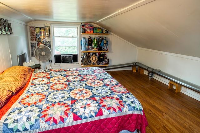 1950 N Crossway Rd, Fair Grove, MO 65648 - bedroom with lofted ceiling, wood finished floors, and cooling unit