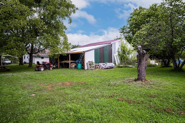 1950 N Crossway Rd, Fair Grove, MO 65648 - view of green lawn with an outbuilding and an outdoor structure