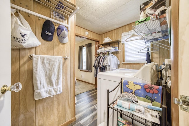 1650 S Fort Ave, Springfield, MO 65807 - laundry area with wood finished floors, wood walls, and washing machine and dryer