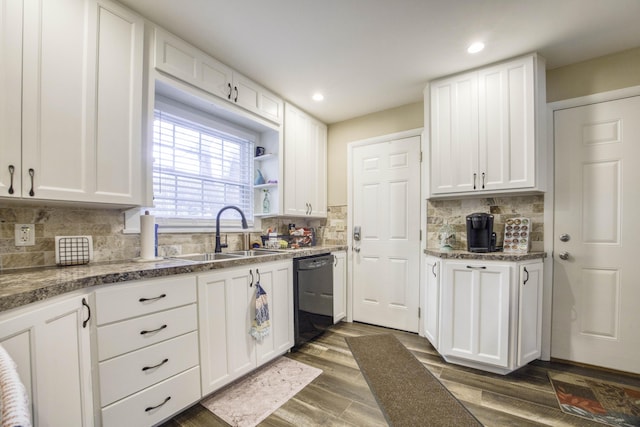 1650 S Fort Ave, Springfield, MO 65807 - kitchen featuring dishwasher, white cabinets, backsplash, and recessed lighting