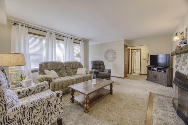 1650 S Fort Ave, Springfield, MO 65807 - living area with light colored carpet and a fireplace