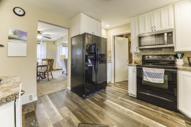 1650 S Fort Ave, Springfield, MO 65807 - kitchen featuring black appliances, dark wood finished floors, white cabinets, backsplash, and a ceiling fan