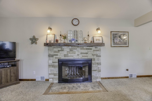 1650 S Fort Ave, Springfield, MO 65807 - carpeted living area featuring a fireplace and baseboards
