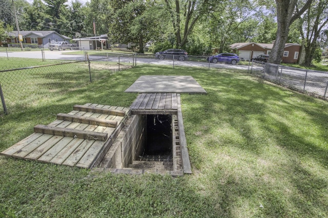 1650 S Fort Ave, Springfield, MO 65807 - view of storm shelter with view of wooded area