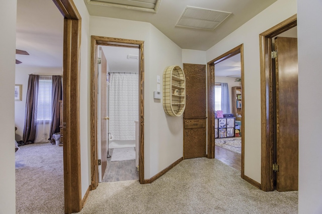 1650 S Fort Ave, Springfield, MO 65807 - hallway featuring carpet and baseboards