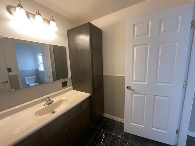 630 W State St, Springfield, MO 65806 - bathroom with vanity and marble finish flooring