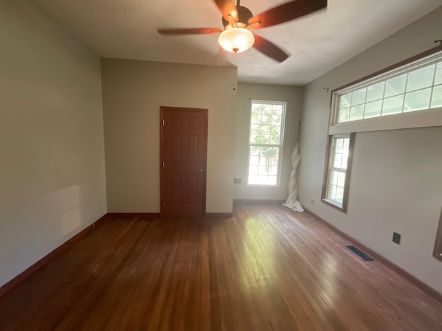 630 W State St, Springfield, MO 65806 - spare room featuring wood finished floors and ceiling fan
