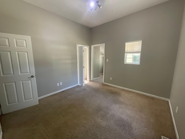 630 W State St, Springfield, MO 65806 - unfurnished bedroom featuring carpet and baseboards