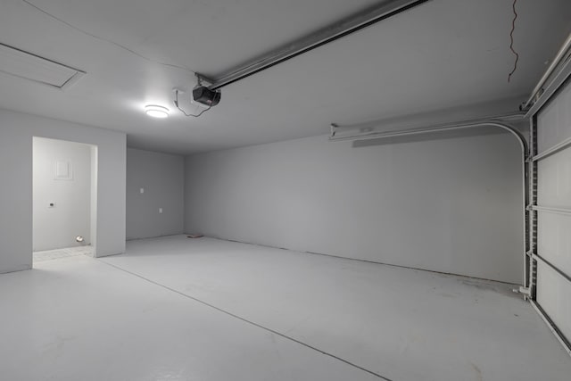 4959 S Mccann Ave, Springfield, MO 65804 - garage featuring a garage door opener