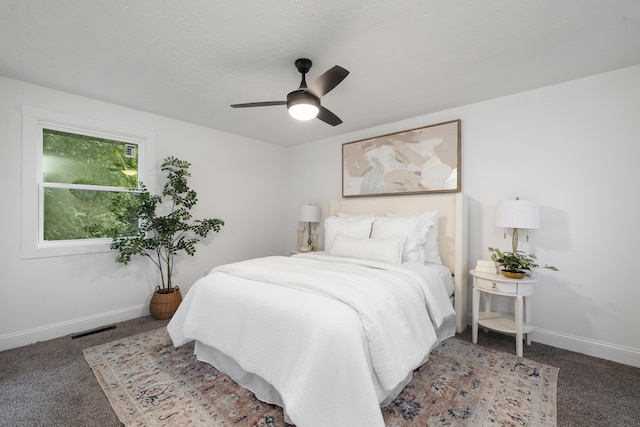4959 S Mccann Ave, Springfield, MO 65804 - carpeted bedroom with baseboards and a ceiling fan