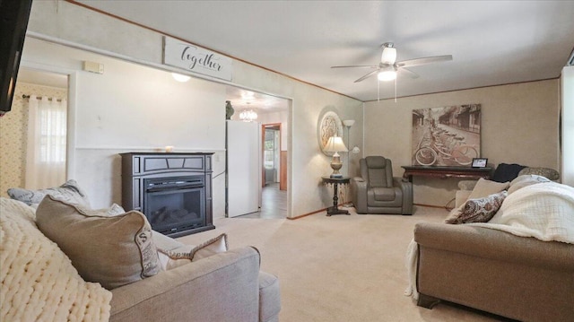 1931 Kay Dr, West Plains, MO 65775 - living room featuring carpet, ceiling fan, and a glass covered fireplace