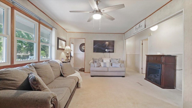 1931 Kay Dr, West Plains, MO 65775 - living area with carpet flooring, a glass covered fireplace, and a ceiling fan