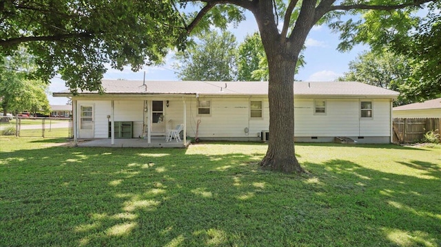 1931 Kay Dr, West Plains, MO 65775 - back of house featuring a patio, a gate, and crawl space